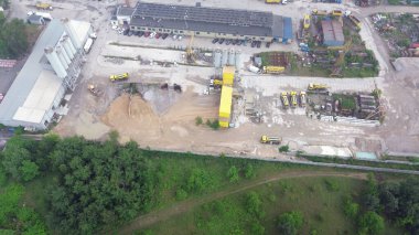 Depolama yığınları Polonya, Avrupa 28.06.2024 olan çimento üretim tesisi