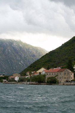 Bay of Kotor with cloudy mountain view clipart