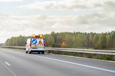 Road assistance vehicle on highway
