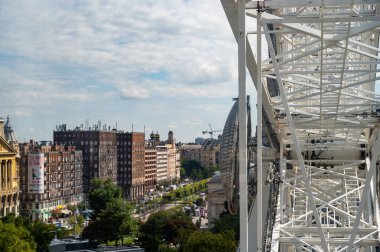 Ferris Wheel In Hungary Budapest. Erzsebet Square, St. Stephen's Basilica, Andrassy Street. Budapest Eye. High quality photo clipart