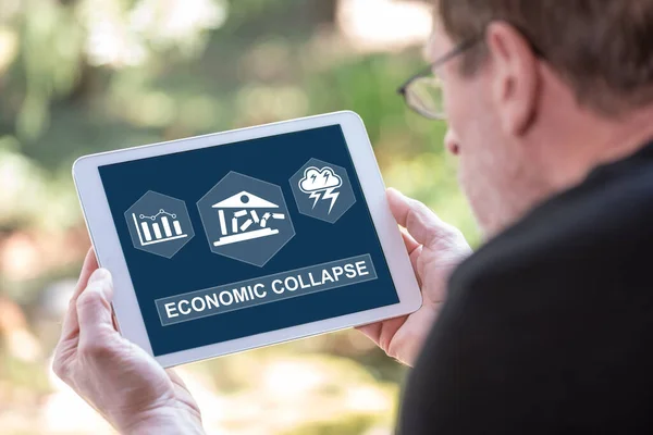 Tablet Screen Displaying Economic Collapse Concept — Stock Photo, Image