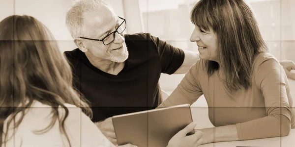 Real Estate Agent Giving Explanations Tablet Senior Couple Geometric Pattern — Stock Photo, Image
