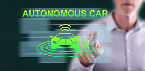 stock image Man touching an autonomous car concept on a touch screen with his finger