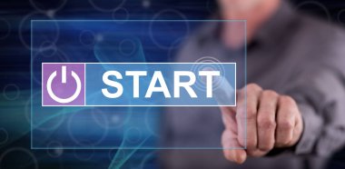 Bir adam dokunmatik ekranda başlangıç konseptine parmağıyla dokunuyor.