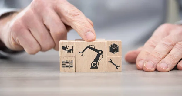 Wooden blocks with symbol of robotic industry concept