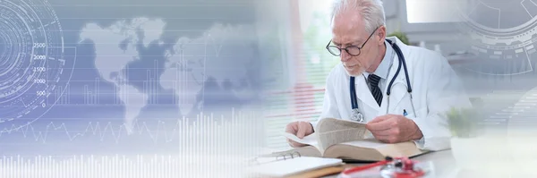 Senior doctor reading a textbook in medical office; panoramic banner