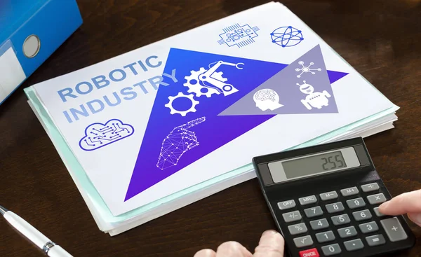 Robotic industry concept illustrated on a paper with a calculator