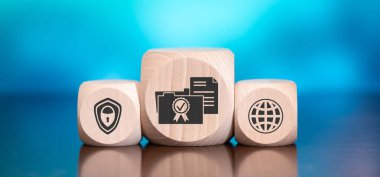 Mavi arka planda patent kavramının sembolü olan tahta bloklar