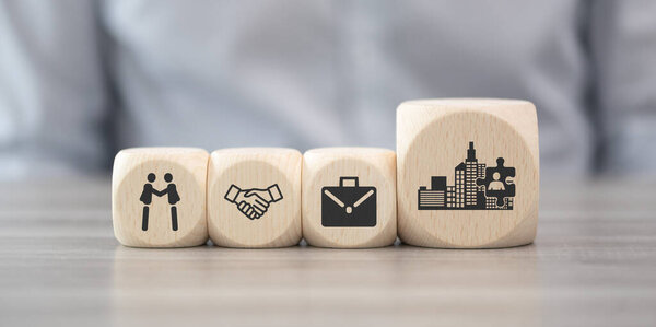 Wooden blocks with symbol of hiring concept