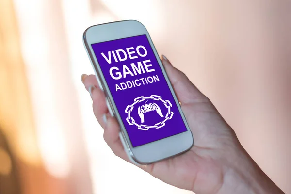 Smartphone screen displaying a video game addiction concept