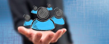 Liderlik kavramı içinde geçmiş bir adamın elini yukarıda