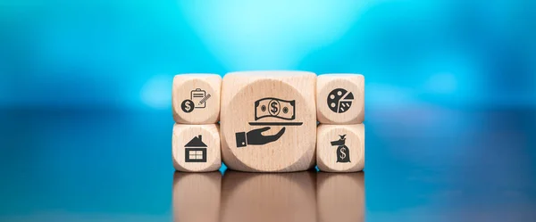 Wooden blocks with symbol of personal loan concept on blue background