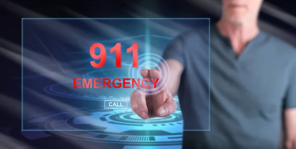 stock image Man touching an emergency concept on a touch screen with his finger