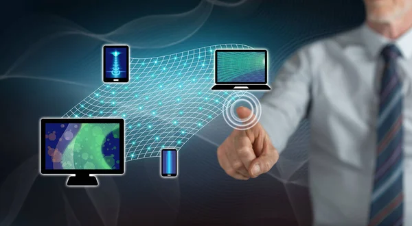 Man touching a device connection concept on a touch screen with his finger