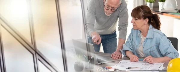 stock image Architects working on new construction project and using laptop; multiple exposure