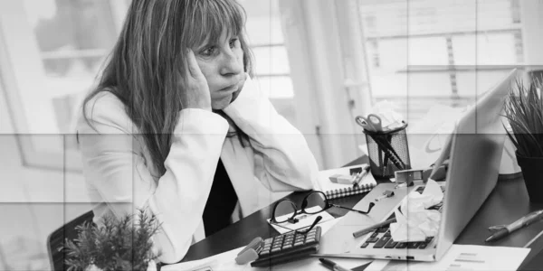 Overworked Mature Businesswoman Sitting Messy Desk Geometric Pattern — стоковое фото