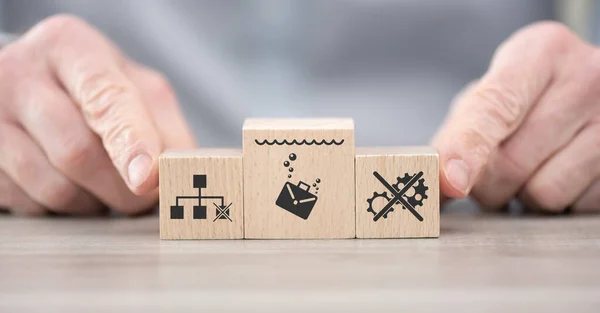 Wooden blocks with symbol of job loss concept