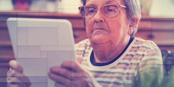 Elderly Woman Using Digital Tablet Geometric Pattern — Photo