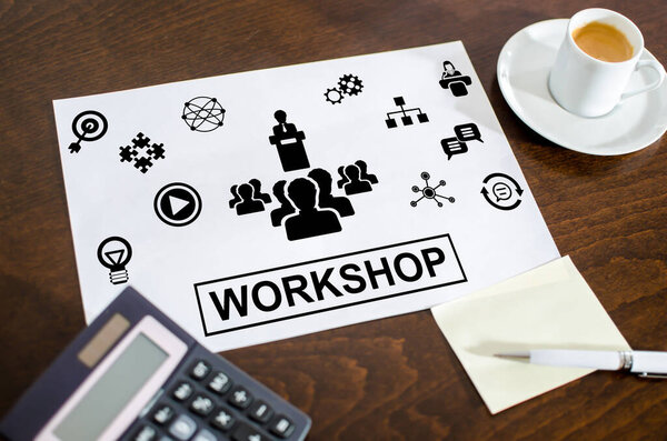 Workshop concept on a paper placed on a desk