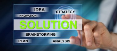 Dokunmatik ekranda çözelti konseptine parmağıyla dokunan adam.