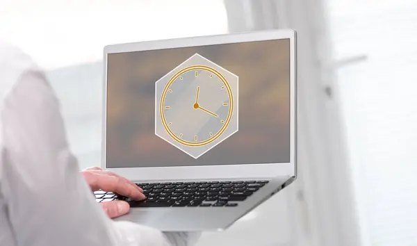 Laptop screen displaying a time management concept