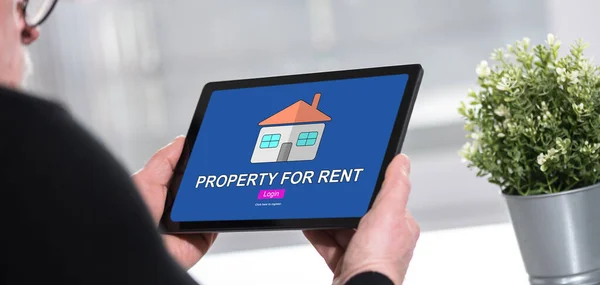 Tablet screen displaying a property for rent concept