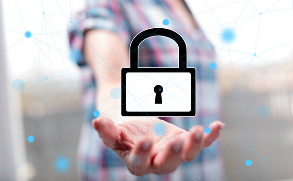 Cyber security concept above the hand of a woman in background