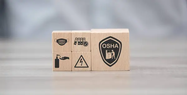 stock image Wooden blocks with symbol of osha concept