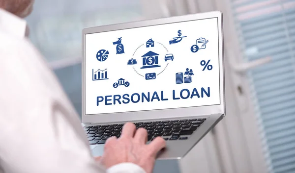 Personal loan concept shown on a laptop used by a man