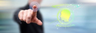 Adam dokunmatik ekranda yapay zeka kavramına parmağıyla dokunuyor.