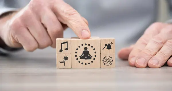 Wooden blocks with symbol of meditation concept