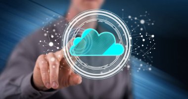 Bir adam dokunmatik ekranda bulut ağı konseptine parmağıyla dokunuyor.