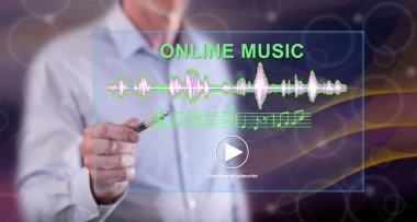 Dokunmatik ekranda kalemle online müzik konseptine dokunan bir adam