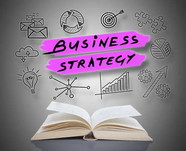 Business strategy concept above an open book