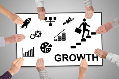 Elle tutulan bir tahtanın üzerindeki büyüme kavramı