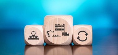 Mavi arka planda lojistik konsepti sembolü olan tahta bloklar