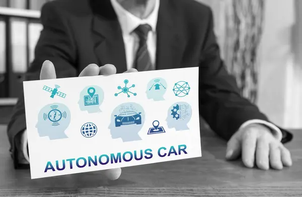 Businessman showing an index card with autonomous car concept