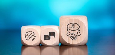 Ahşap bloklar mavi arka planda giriş kavramının sembolü.