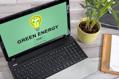Dizüstü ekran yeşil enerji kavramı ile