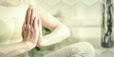 Woman practicing meditation, geometric pattern