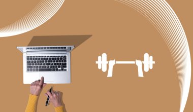 Spor konsepti sembollü dizüstü bilgisayar kullanan ellerin üst görünümü