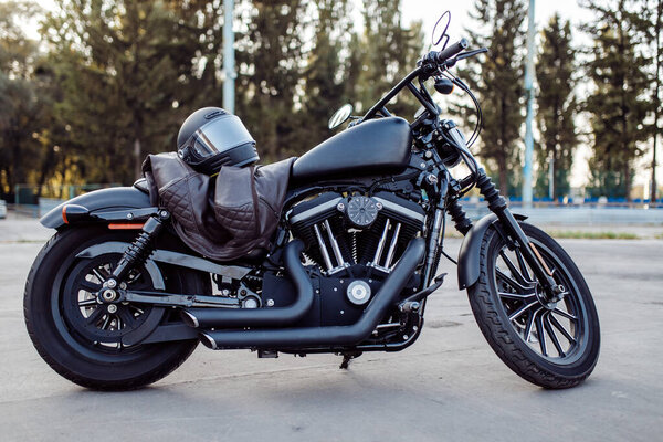 Super bike Harley Davidson black motorcycle sholm and jacket on bike