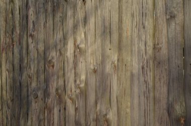 A row of old boards next to each other..