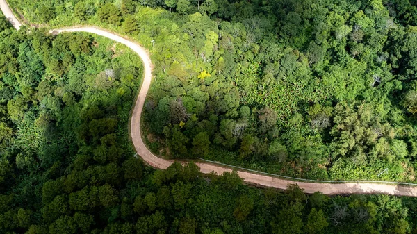 Vista Aérea Desde Dron Carretera Montaña Con Sol Brillando Bosque —  Fotos de Stock
