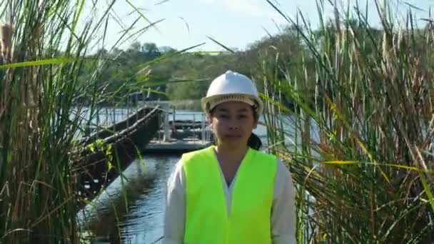 Portrait Environmental Engineer Wearing White Helmet Working Reservoir Water Ecology — Video
