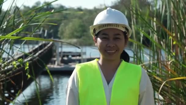 Portrait Environmental Engineer Wearing White Helmet Working Reservoir Water Ecology — Stockvideo