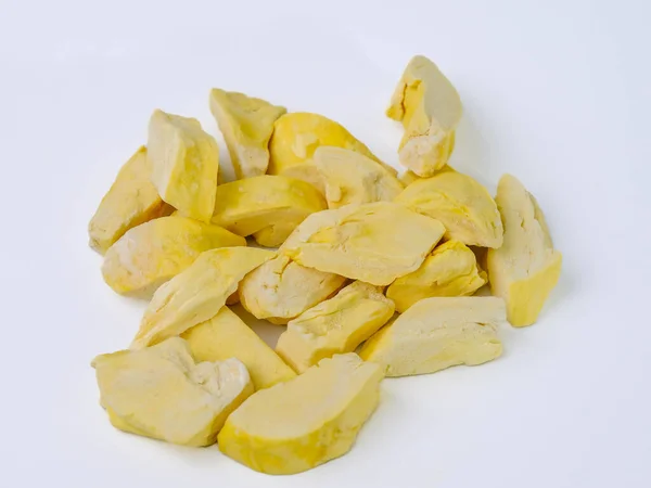 Freeze-dried durian, is a processed fruit that retains the nutritional value of food. A pile of freeze-dried durians isolated on white background. Clipping path.