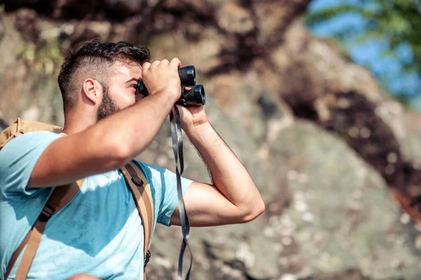 Handsome Young Man Looks Binoculars Mountain — Stock Photo, Image