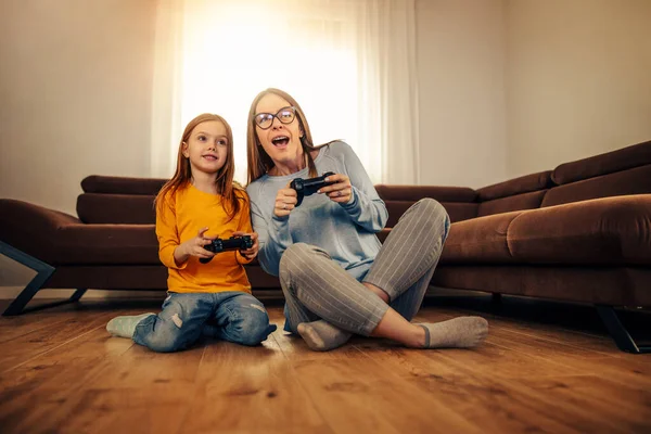 Weekend Home Cute Little Girl Her Mom Playing Video Games — Stock Photo, Image