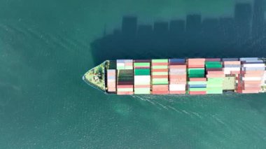 Large container ship at sea -Top down view. Aerial top view of cargo container ship vessel import export container sailing.